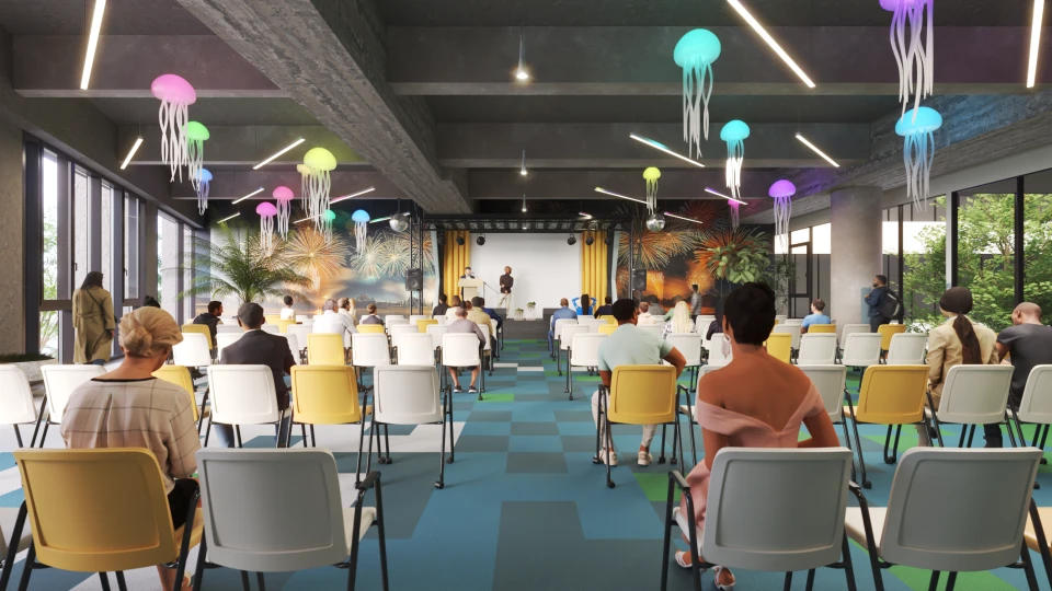 Großer Konferenzraum mit inspirierendem Bühnenhintergrund, festlicher Dekoration und modernen Sitzplätzen für Events